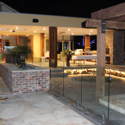 Entertainer's outdoor area construction and landscaping in Leopold